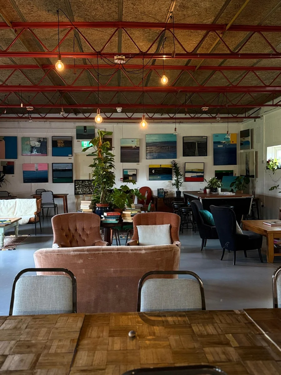 Sofas and tables in the restored community space
